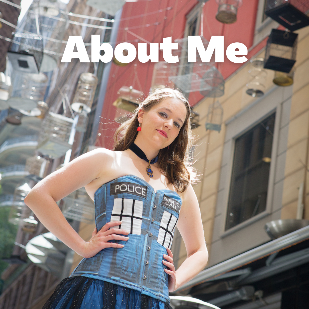 An Image of a woman looking at the camera, dressed in a TARDIS patterned corset. Text reads: About Me.