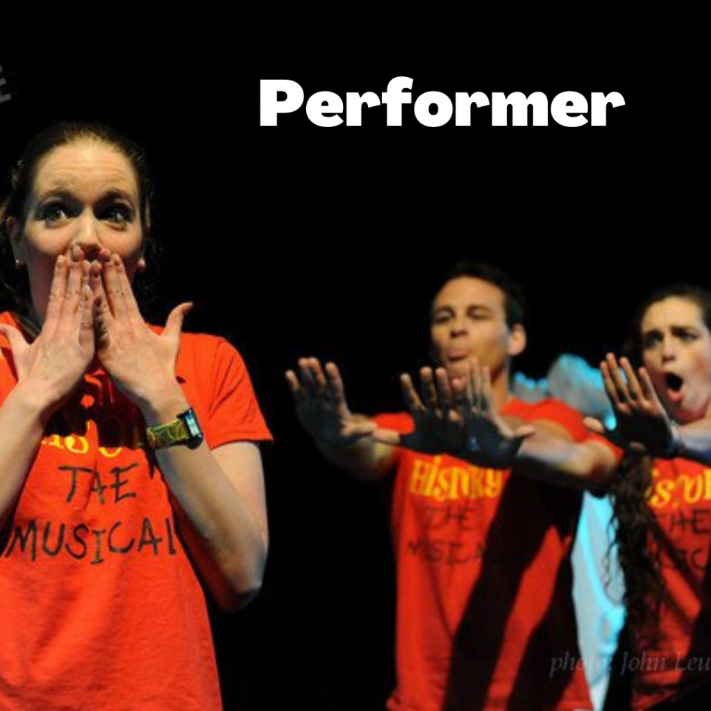 Three people in red shirts, the woman on the left covers her mouth with a look of shock, the two figures on the right have their hands out in front of them in surprise. Text reads: Performer